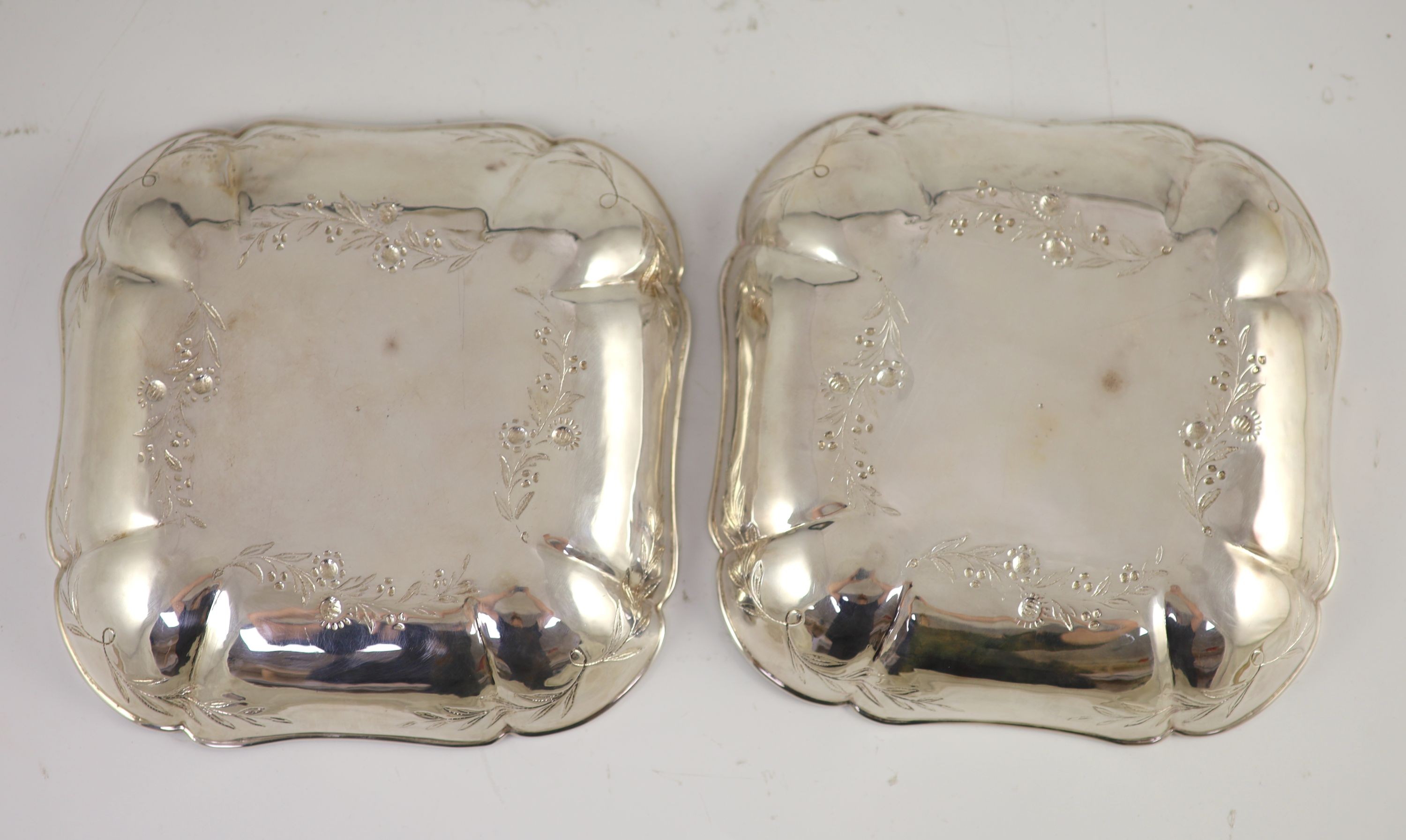 A pair of George III silver square shaped strawberry dishes John Mewburn